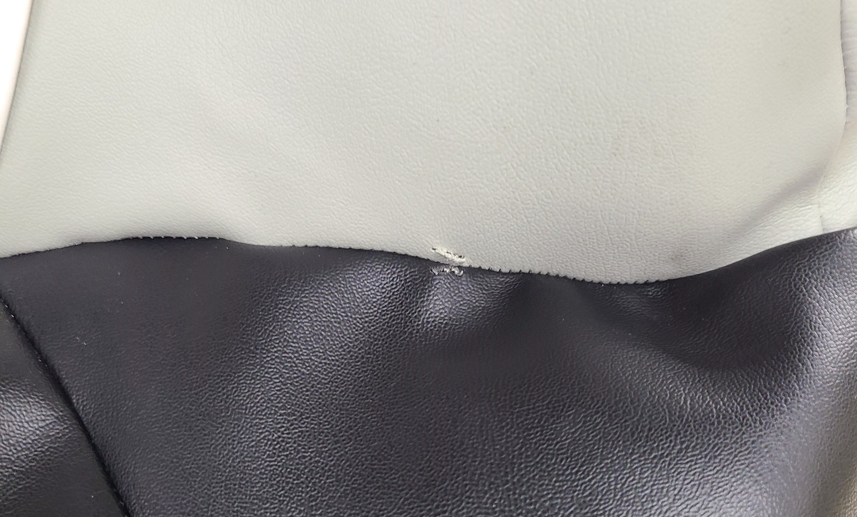 Rip in Side Cushion From a Short Distance.jpg